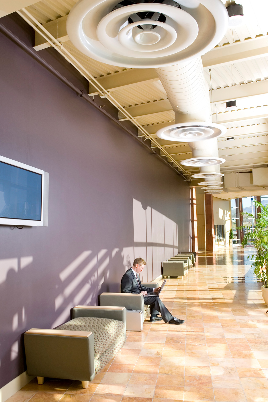 Businessman in Commercial Office Space
